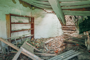 Interior Of Ruined Abandoned Private Country House With Caved Roof In Evacuation Zone After...