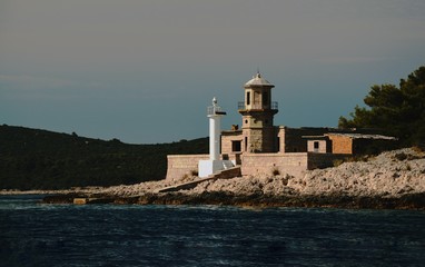 Fototapeta na wymiar Small white lighthouse