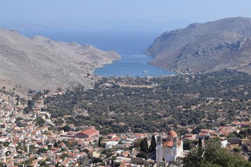 Beautiful mountain landscape. Sea city. Mountain village. Greek island. Greece.Simi Island.	