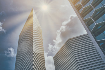 business city, background of business buildings with sunshine