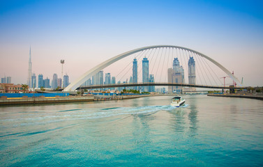 Fototapeta premium Tolerance bridge and boat in Dubai city, UAE