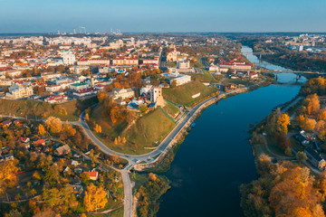 Fototapeta premium Grodno, Belarus. Aerial Bird's-eye View Of Hrodna Cityscape Skyline. Famous Popular Historic Landmarks In Sunny Autumn Evening