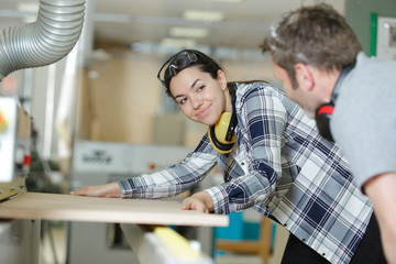 woman learning to cut wood © auremar