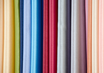 Cuts of fabrics of different colors on a hanger