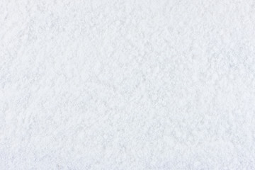Obraz premium Winter snow texture. Top view of the snowy white texture. Snowflakes.