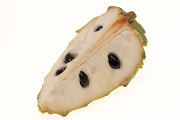 tropical fruits in a cut on a white background