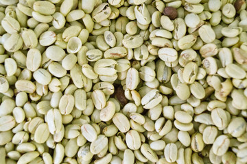 light coffee grains on the table for background