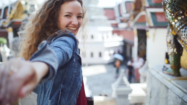 Couple of beautiful girls visiting bangkok maining attractions