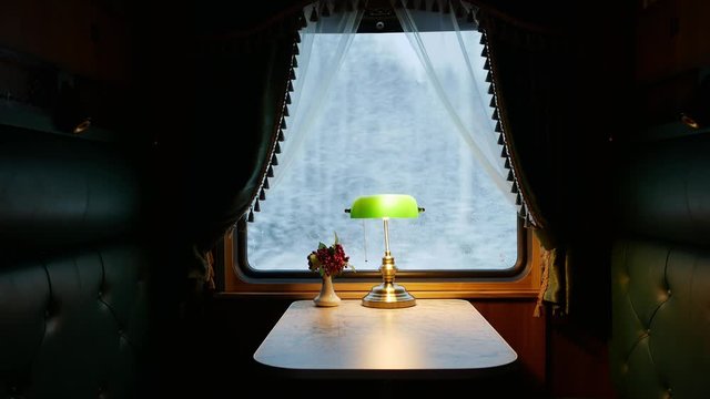 Russia, Saint-Petersburg. December 2019: interior of a retro train car. view from the compartment of the car in the window. focus outdoor