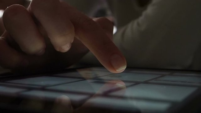 closeup finger touching tablet computer touchscreen 4k