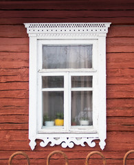 Figured wooden frame window