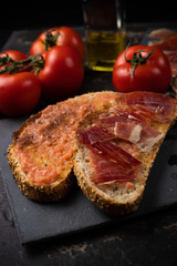 toast with ham oil and tomato