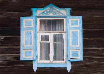 Figured wooden frame window