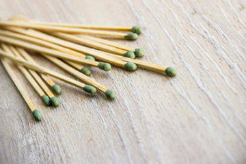 matches are on a beige wooden