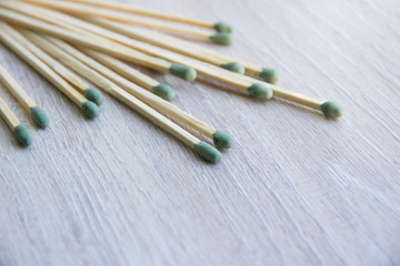 matches are on a beige wooden