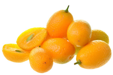 Group of fresh kumquat close up isolated.