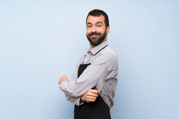 Happy Chef over blue wall