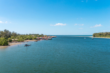 The village Ban Saladan where all ferries and boats arrive, situated at the estuary of a watercourse into the Andaman sea. The waterway leads to the mangroves woods inland site