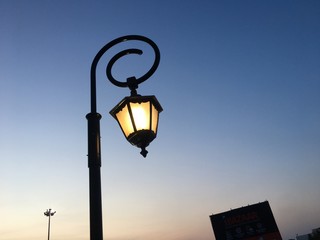 Fototapeta na wymiar lantern on the background of blue sky