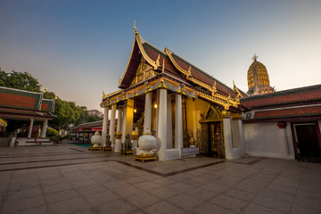 Background of religious tourist attractions, the old Buddha Church (Phra Buddha Chinaraj National Museum), with both Thai and foreign tourists coming to make merit always in Thailand.