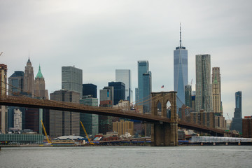 Fototapeta na wymiar People walking in Brooklyn bridge at day time
