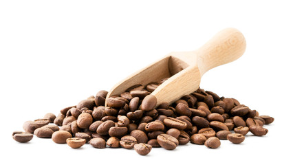 Coffee beans with a wooden spatula on a white background. Isolated