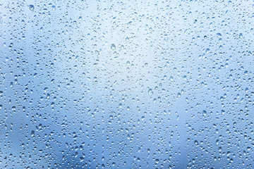 Window with Drops after heavy Rain, Water Drops on Glass as Background or Texture