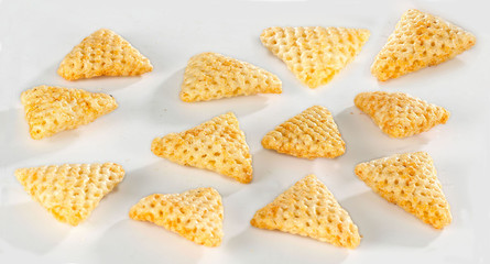 3d Triangle shape Fryums Papad is a crunchy Snack Pellets, tri angle corn puff snacks or namkeen - obrazy, fototapety, plakaty
