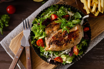 Grilled chicken with fresh salad