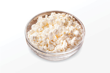 Desi Makhan, Fresh cottage cheese in a bowl with spoon & buttermilk on a white background. - image.