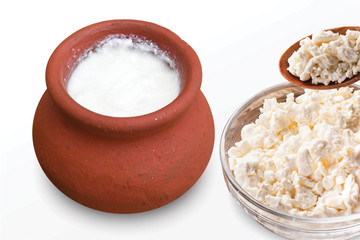 Desi Makhan, Fresh cottage cheese in a bowl with spoon & buttermilk on a white background. - image.