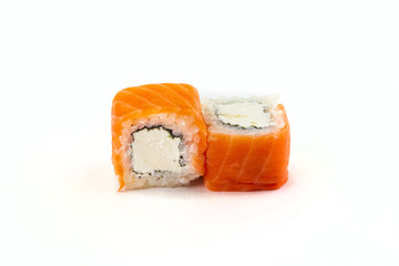Asian food, sushi with sesame, salmon and cream cheese inside