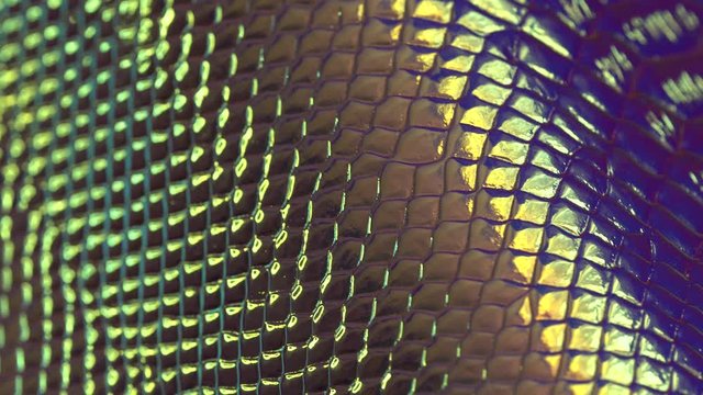 Faux snake skin background. Metallic Iridescent Faux Holographic Leather