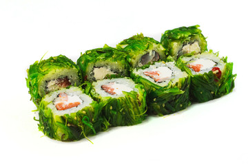 Asian food, sushi with sesame, salmon and cream cheese inside