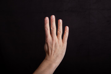 hand counts four, four fingers outstretched, sign for four