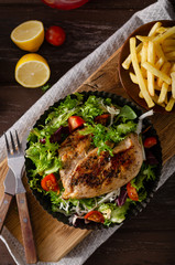 Grilled chicken with fresh salad