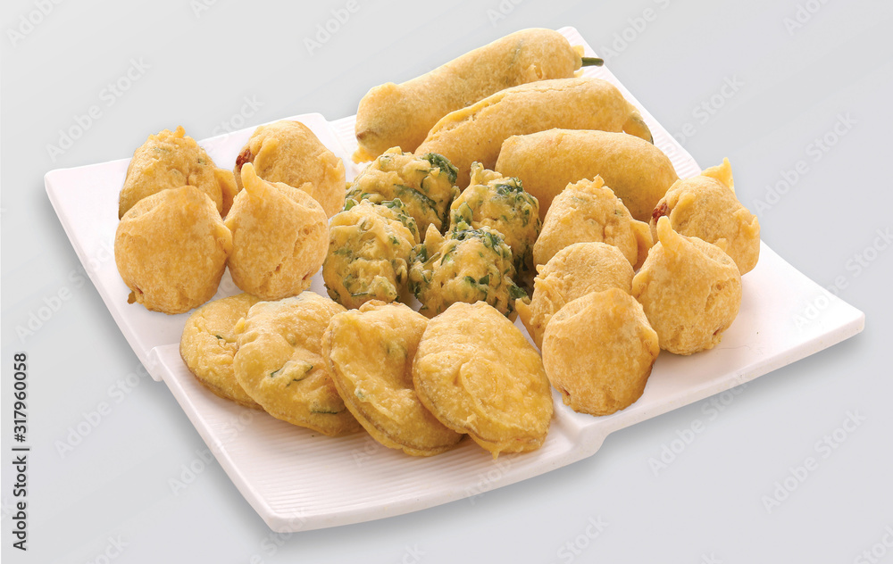 Wall mural methi gota (fenugreek) pakoda, chili pakoda, potato pakoda (vada) or fritters indian food snack, bha