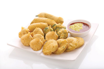 Methi Gota (fenugreek) Pakoda, Chili pakoda, potato pakoda (vada) or Fritters indian food snack, bhajiya, white background, photographi - Image