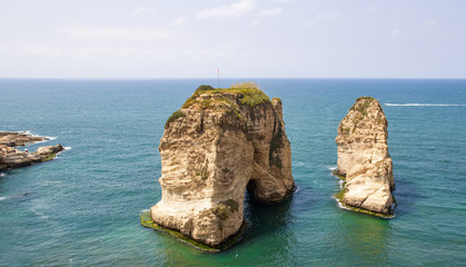 Naklejka premium Beirut, Lebanon - probably the most popular landmark in Beirut, the Raouché Rocks are a wonderful spot visitated by thousands of tourists every day