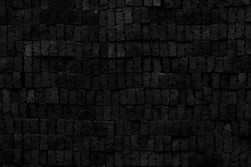 Background of old black brick wall.