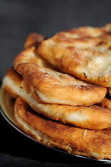 Freshly baked potato patties on a plate. Shallow depth of field