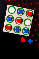 Valentine's day concept with hearts X-O game. Top view