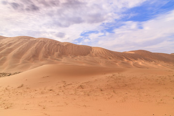 Fototapeta na wymiar Badain Jaran Desert, desert, Inner Mongolia, the third largest desert in China, with the tallest stationary dunes on Earth and100 spring-fed lakes between the dunes