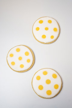 Cookies Decorated With White And Yellow Polka Dots