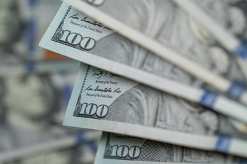 Pile of one hundred US dollar bills. United States 100 dollar bills. One hundred American dollars....