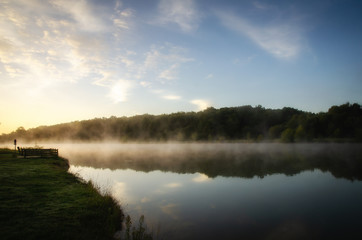 Fototapeta na wymiar Misty morning on Uby lake, France