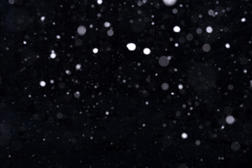 snow on a black background. snow texture