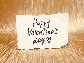 Happy Valentine’s Day - card with lettering on glittering golden background