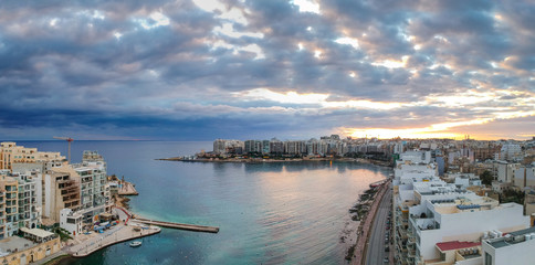 Sunrise over the Spinola Bay in St. Julian's, Malta