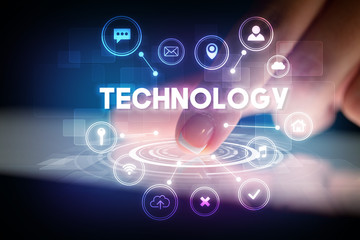 Finger touching tablet with web technology icons and TECHNOLOGY inscription, web technology concept